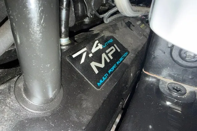 Slide: The Image of 7.4L MPI engine detail of 1999 Sea Ray 330 Express Cruiser. - 11