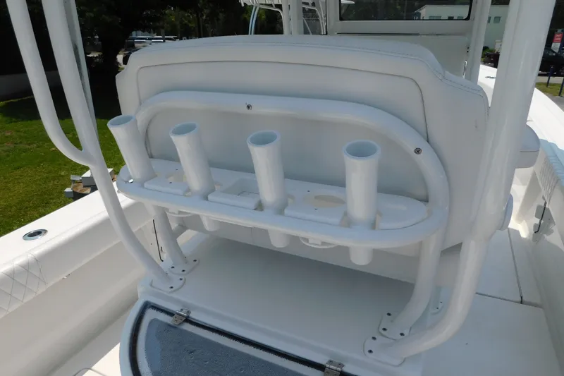 Slide: The Image of 2026 Pair Customs 24 Center Console DV Offshore boat with rod holders and seating. - 11