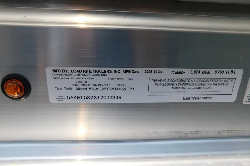 Slide: The Image of Load Rite Trailers label on 2026 Pair Customs 24 Center Console DV Offshore boat trailer. - 47