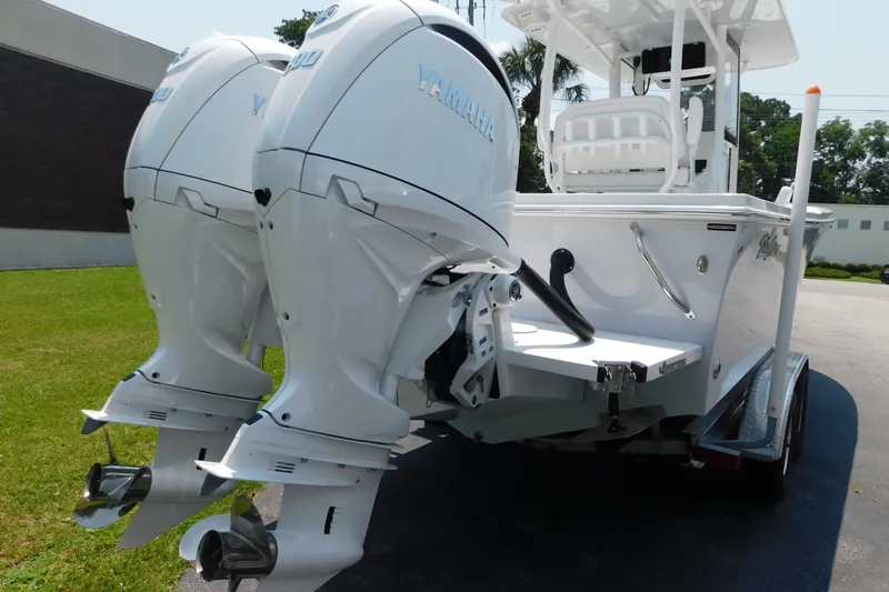 Slide: The Image of 2026 Pair Customs 24 Center Console DV Offshore boat with dual Yamaha outboard engines. - 28