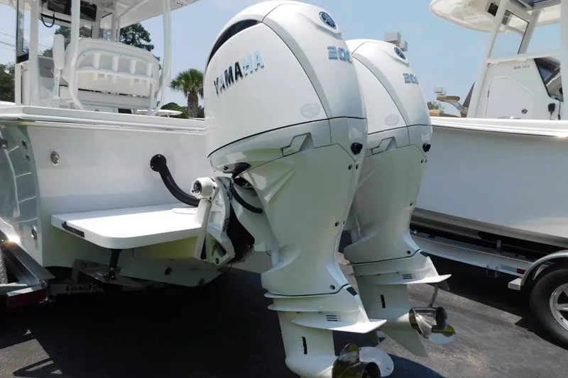 Slide: The Image of 2026 Pair Customs 24 Center Console DV Offshore with dual Yamaha outboard engines. - 27