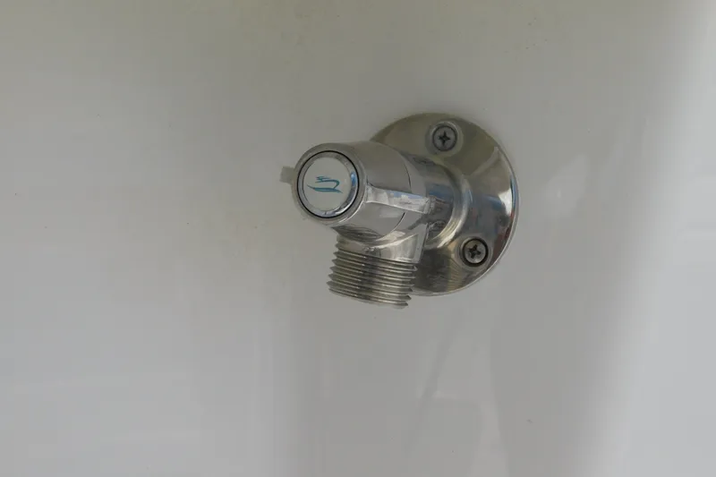 Slide: The Image of Chrome fitting on 2026 Pair Customs 24 Center Console DV Offshore boat. - 23