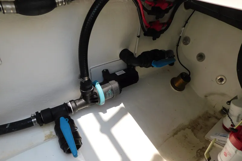Slide: The Image of Interior view of 2026 Pair Customs 24 Center Console DV Offshore boat's plumbing system. - 41