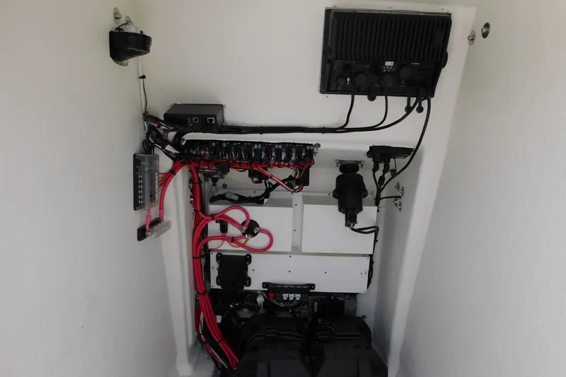 Slide: The Image of Electrical wiring and components inside a 2026 Pair Customs 24 Center Console DV Offshore boat. - 39