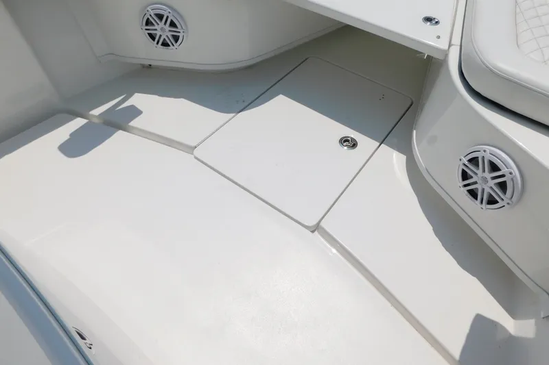 Slide: The Image of Interior view of 2026 Pair Customs 24 Center Console DV Offshore boat, featuring sleek design elements. - 36