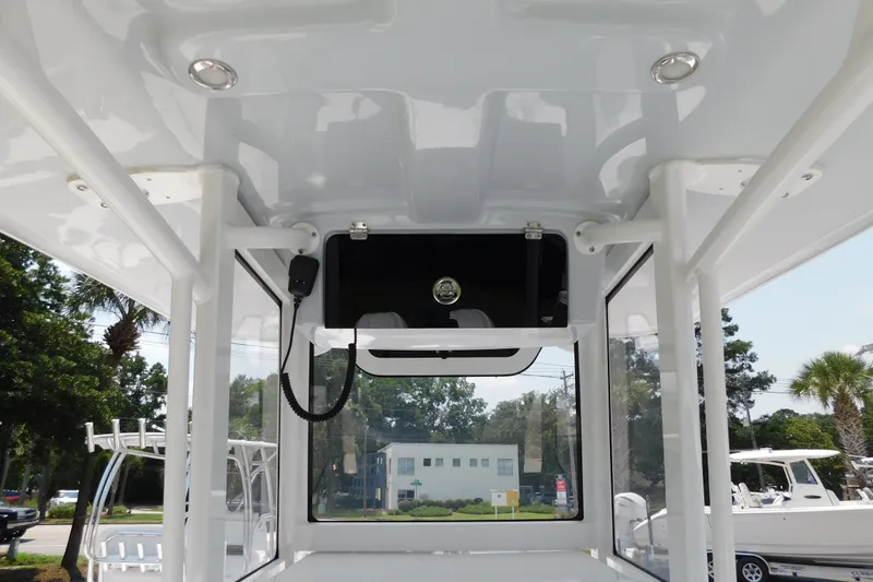 Slide: The Image of 2026 Pair Customs 24 Center Console DV Offshore boat interior with modern design features. - 16
