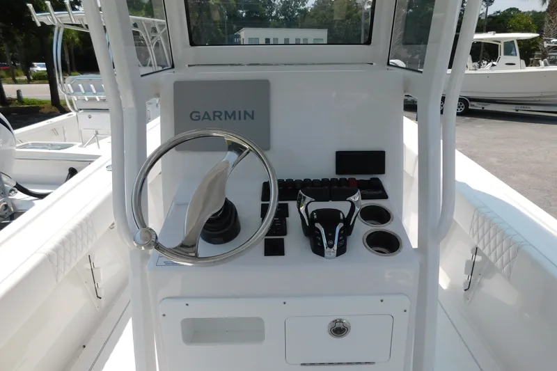 Slide: The Image of Center console of 2026 Pair Customs 24 Center Console DV Offshore boat with Garmin system. - 4
