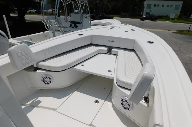 Slide: The Image of 2026 Pair Customs 24 Center Console DV Offshore boat with white seating and modern design. - 33
