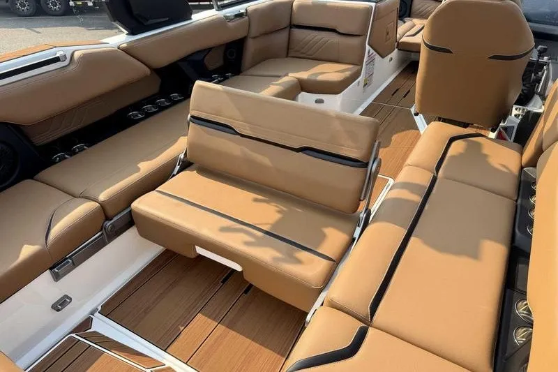 Slide: The Image of Luxurious interior of 2027 Supra SR boat with tan leather seating and modern design. - 17