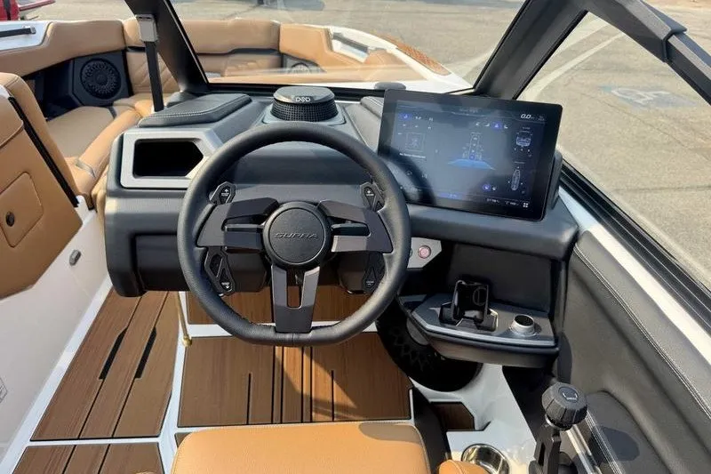 Slide: The Image of 2027 Supra SR boat interior with modern steering wheel and digital display. - 10