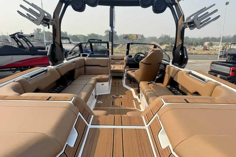 Slide: The Image of Luxurious 2027 Supra SR boat interior with tan seating and modern design elements. - 9
