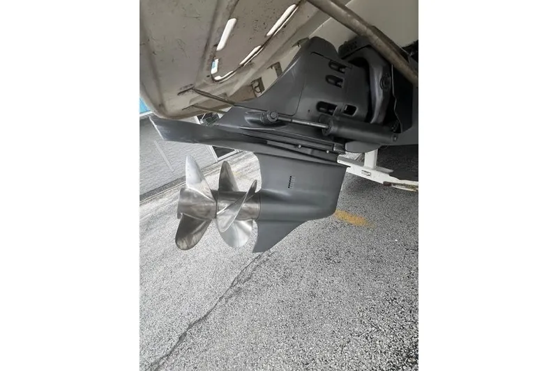 Slide: The Image of Close-up of a 2000 Larson Cabrio 254 boat propeller and stern drive. - 16