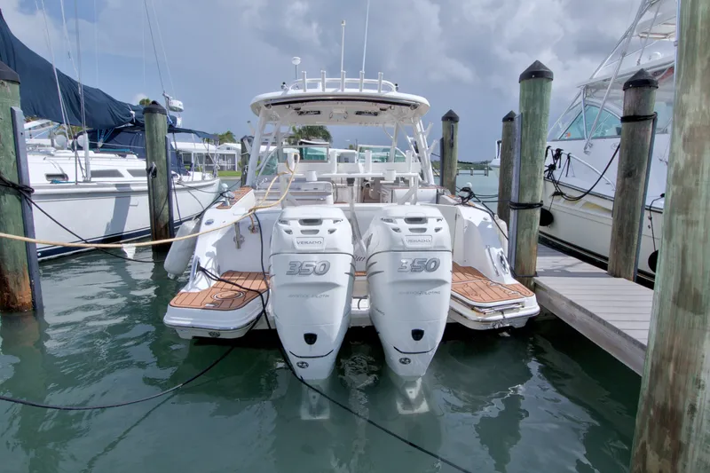 Slide: The Image of 2017 Boston Whaler 320 Vantage docked with twin 350 Verado engines. - 14