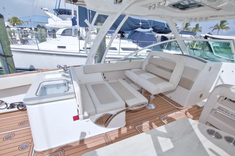 Slide: The Image of 2017 Boston Whaler 320 Vantage interior with luxurious seating and sleek design. - 27