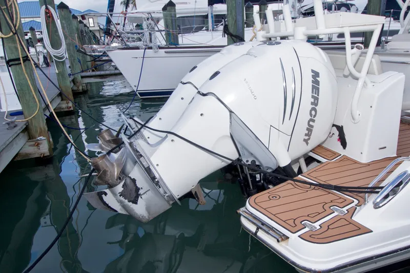 Slide: The Image of 2017 Boston Whaler 320 Vantage with Mercury outboard engine at dock. - 59