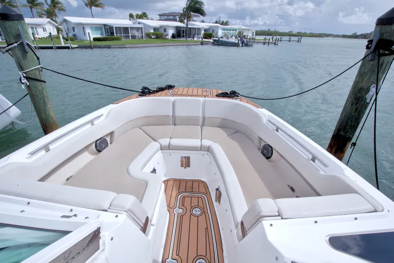 Slide: The Image of 2017 Boston Whaler 320 Vantage boat interior with spacious seating and waterfront view. - 42