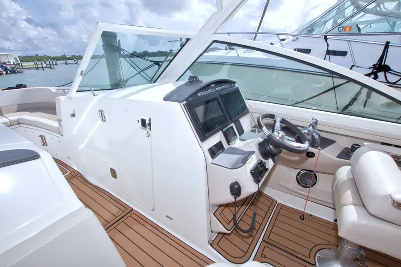 Slide: The Image of 2017 Boston Whaler 320 Vantage boat interior with modern helm and seating. - 34