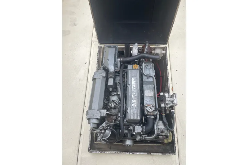 Slide: The Image of Inboard engine of 1996 Rosborough Seaskiff 22 Wheelhouse, showcasing mechanical components. - 16