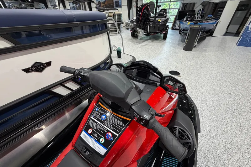 Slide: The Image of 2026 Yamaha WaveRunner VX Deluxe in showroom, featuring sleek red design and advanced controls. - 4