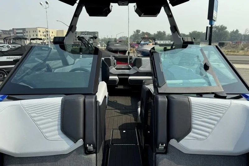 Slide: The Image of 2027 MasterCraft X23 boat interior with modern seating and sleek design. - 17