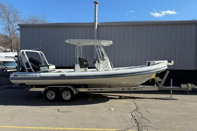 The Image of 2026 Highfield Sport 760 boat on trailer, parked outdoors. - 0