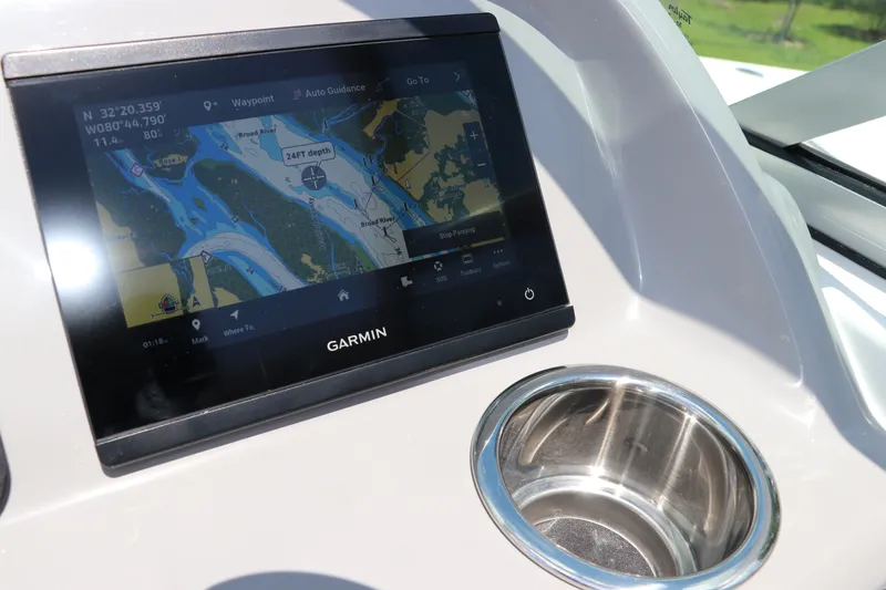 Slide: The Image of Garmin navigation display on 2027 Robalo R207 Dual Console boat dashboard. - 27