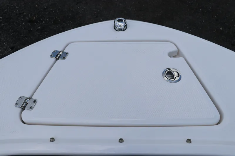 Slide: The Image of 2027 Robalo R207 Dual Console boat hatch with stainless steel hardware. - 38