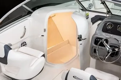 Slide: The Image of 2027 Robalo R207 Dual Console interior with helm and seating area. - 6