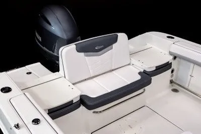 Slide: The Image of 2027 Robalo R207 Dual Console boat with sleek seating and modern design. - 3