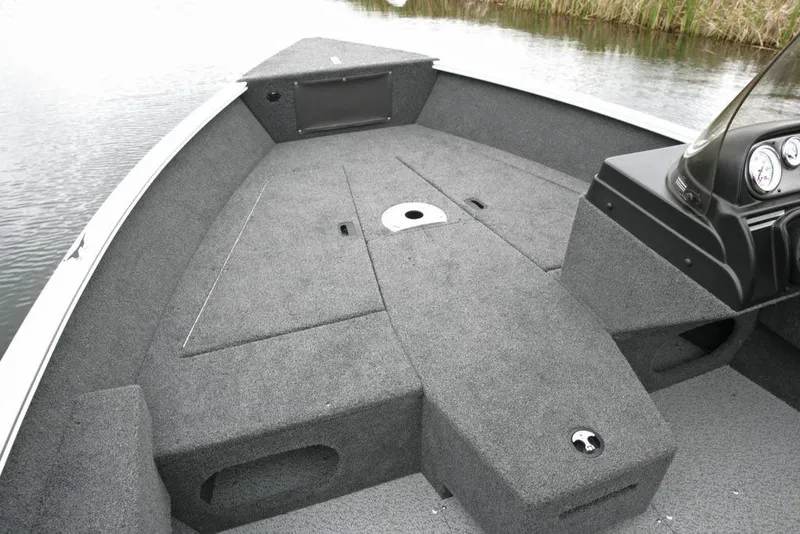 Slide: The Image of Manufacturer Provided Image: 2020 Lund 1675 Adventure SS boat interior with spacious deck and storage compartments. - 16
