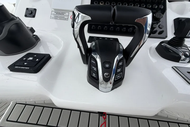 Slide: The Image of Control panel of 2026 Tidewater 320 CC Adventure boat with advanced navigation features. - 16