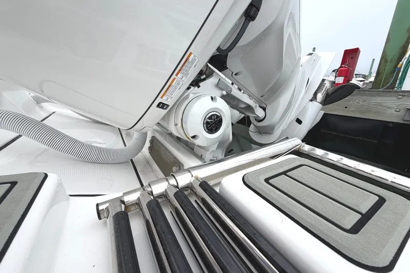 Slide: The Image of 2026 Tidewater 320 CC Adventure boat engine and deck details. - 46