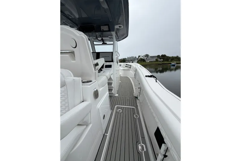 Slide: The Image of 2026 Tidewater 320 CC Adventure boat interior with sleek design and modern features. - 38