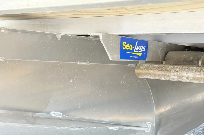 Slide: The Image of Sea-Legs system on 2015 South Bay 520CR pontoon boat, showcasing aluminum construction. - 15