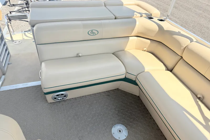 Slide: The Image of Beige seating area on a 2015 South Bay 520CR pontoon boat. - 13