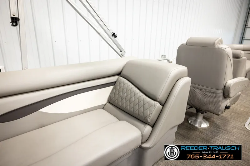 Slide: The Image of 2021 Bennington SVSR boat interior with luxurious seating and modern design. - 28