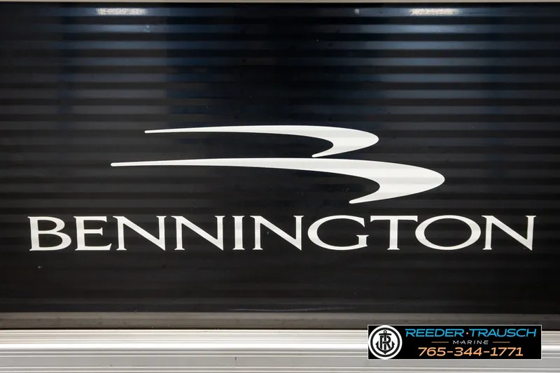 Slide: The Image of Bennington SVSR 2021 logo on a sleek black background with dealership contact details. - 53