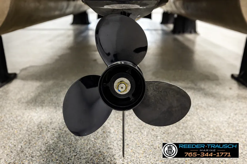 Slide: The Image of Close-up of a 2021 Bennington SVSR boat propeller on display. - 50
