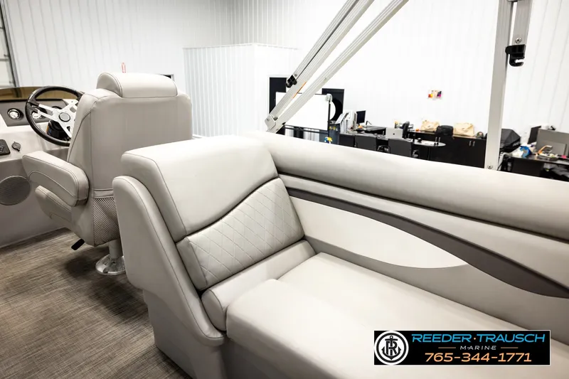 Slide: The Image of 2021 Bennington SVSR boat interior with luxurious seating and modern design. - 26