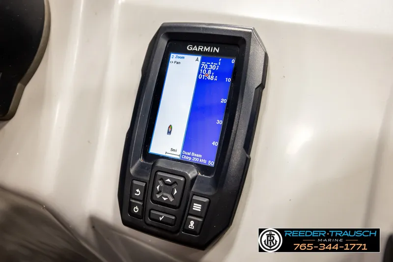 Slide: The Image of Garmin navigation system on 2021 Bennington SVSR boat dashboard, Reeder-Trausch Marine branding. - 39