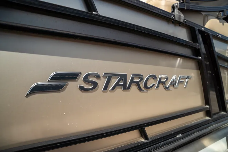 Slide: The Image of Close-up of the Starcraft logo on a boat. - 2