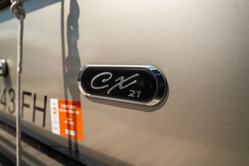 Slide: The Image of Close-up of the 2021 Starcraft CX 21 R with model badge on the side. - 3