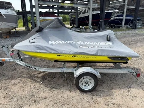 Slide: The Image of A 2023 Yamaha EX WaveRunner on a trailer, covered with a gray tarp. - 3