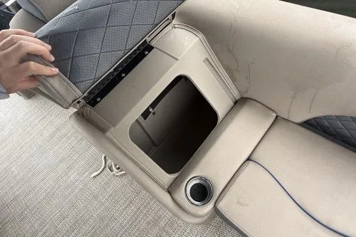 Slide: The Image of 2024 Bennington 22LSR boat seat storage compartment with cup holder and quilted upholstery. - 10