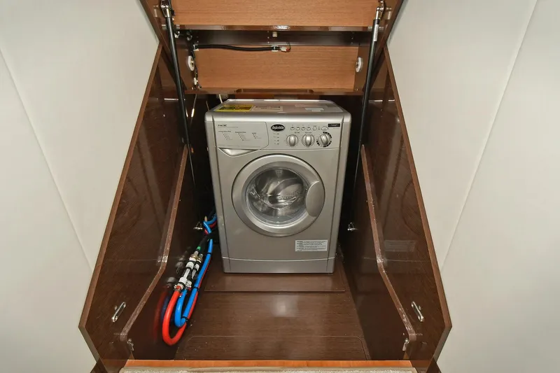 Slide: The Image of Compact washing machine in a Prestige 590 yacht cabinet, 2020 model. - 31