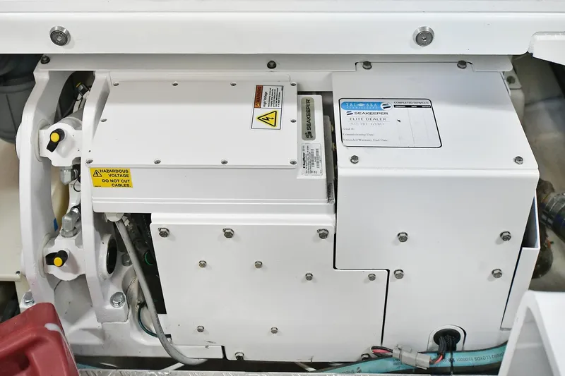 Slide: The Image of Engine compartment of a 2020 Prestige 590 yacht featuring Seakeeper stabilizer system. - 45