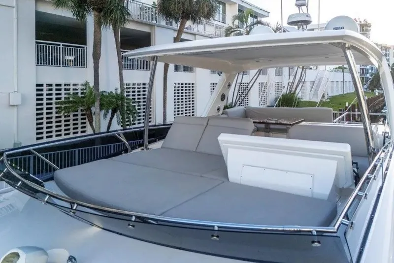 Slide: The Image of Luxury 2020 Prestige 590 yacht with spacious deck and modern seating area. - 8