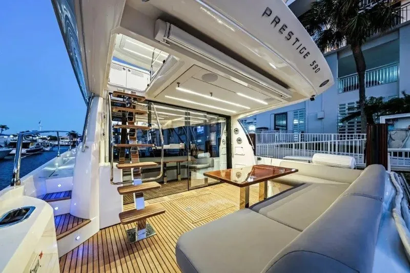 Slide: The Image of Luxurious 2020 Prestige 590 yacht interior with elegant seating and modern design. - 5