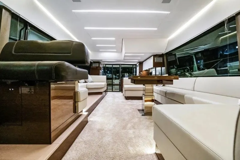 Slide: The Image of Luxurious interior of a 2020 Prestige 590 yacht with elegant seating and modern lighting. - 37