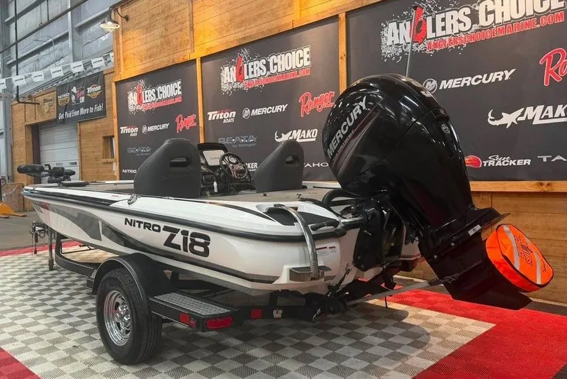 Slide: The Image of 2017 Nitro Z18 boat with Mercury engine on display at Angler's Choice event. - 2
